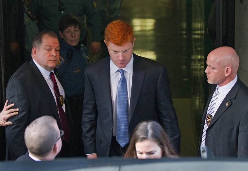 Mike McQueary, center, Penn State assistant coach, testified Friday that he walked in on Jerry Sandusky engaging in what McQueary believes was the sexual assault of a boy in 2002.