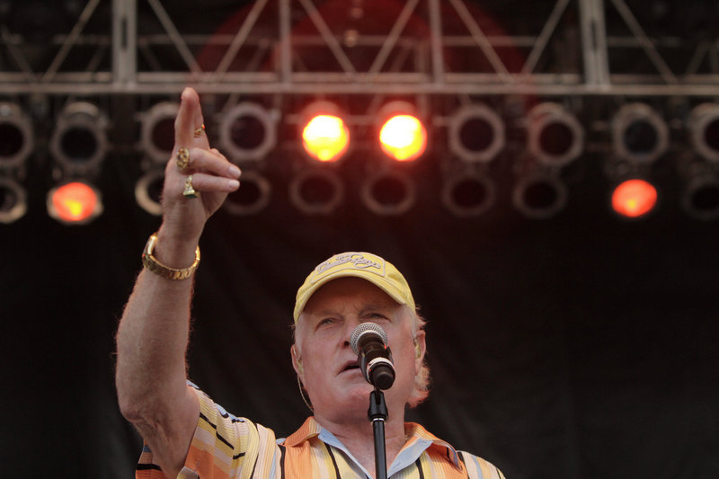 Mike Love of the Beach Boys performs in September in Denver. He, Brian Wilson and Al Jardine say they are getting back together to celebrate the Beach Boys' 50th anniversary.