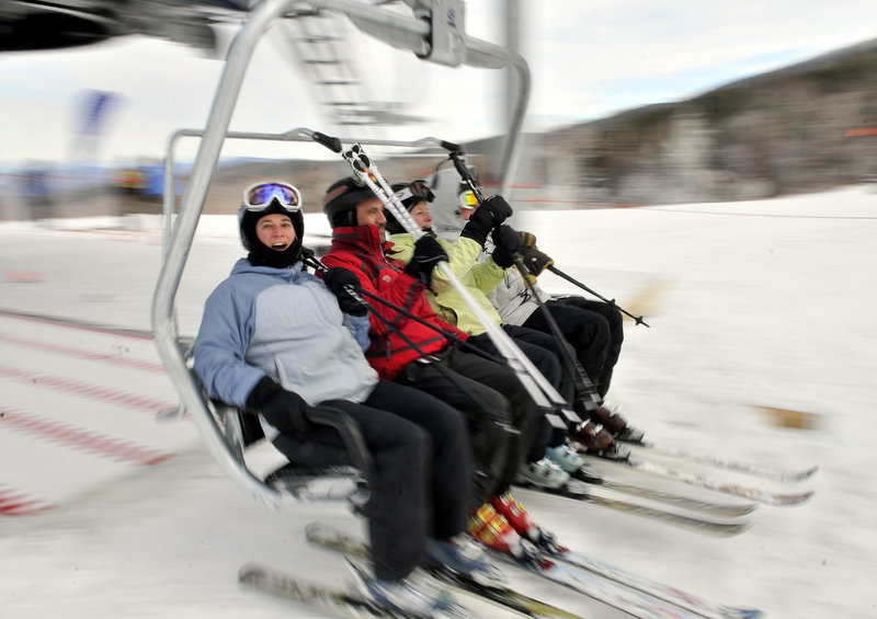 Skiers fill the new Skyline lift at Sugarloaf on Saturday. In an informal survey, skiers said they were thrilled with the new lift’s speed and its proximity to the expert terrain.