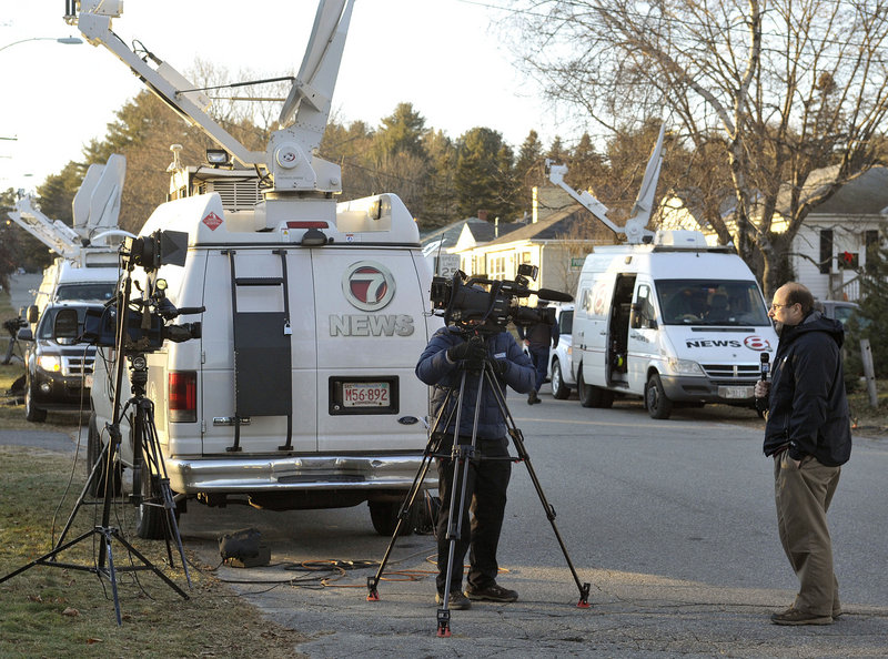 News crews line Violette Avenue, near the home of the girl’s father, Justin DiPietro.
