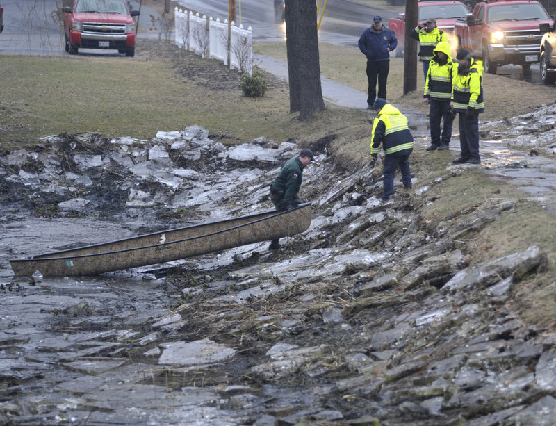 Maine Warden Service personnel and emergency crews search a drainage pond on First Rangeway Road in Waterville Wednesday for clues to the disappearance of Ayla Reynolds.