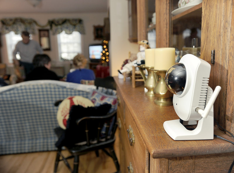 A webcam perched on the hutch between Patty Gardner’s kitchen and living room is monitored at least four times a day as part of the elder-care services supplied by Full Circle America. Motion sensors in her bedroom and bathroom are also monitored.