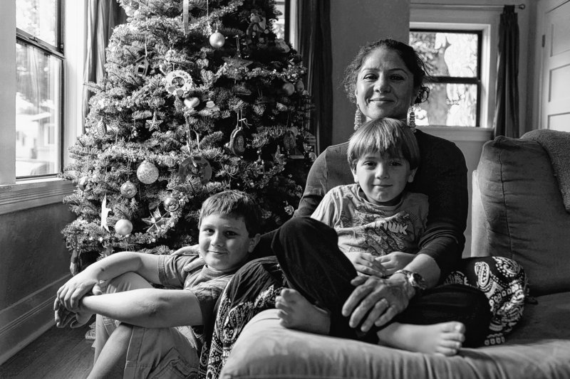 Sahira Traband of Los Angeles, who is Muslim, views Christmas as a happy time that she wants to celebrate with her sons, Teo, 10, left, and Mikail, 6. She puts up decorations, and doesn’t see a conflict with her religious beliefs.