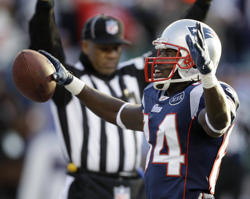 Deion Branch of the New England Patriots celebrates Saturday after catching the third-quarter touchdown pass that started the comeback against the Miami Dolphins.