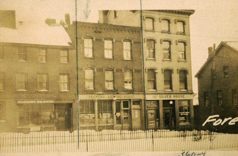 The historic block of buildings along Fore Street at Boothby Square, with 340 Fore St. at the far right in the 1924 archival image.