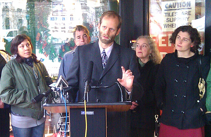 Garrett Martin, executive director of the Maine Center for Economic Policy, discusses the benefits of consumers spending money at locally owned businesses. He spoke at a press conference this morning at Longfellow Books in Portland.
