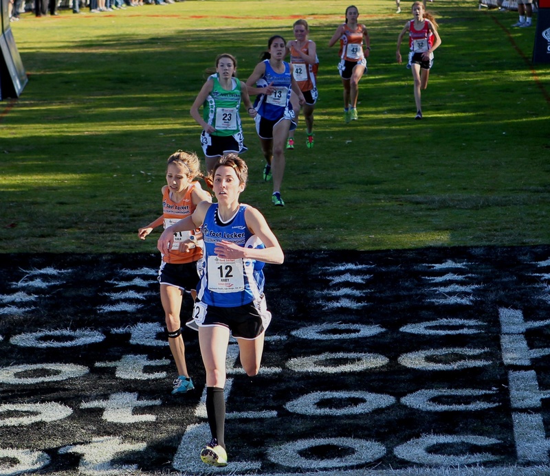 Abbey Leonardi of Kennebunk crosses the finish line at the Foot Locker national championships in San Diego in fourth place – the highest finish ever for a Maine girl.