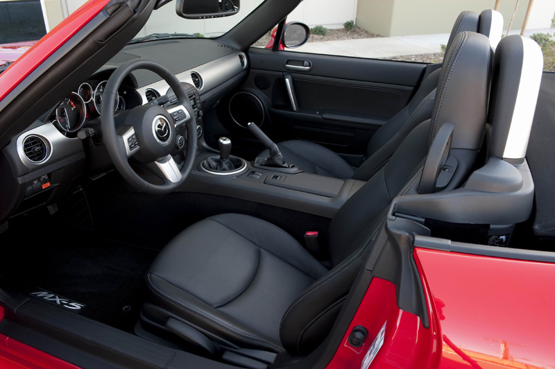 Inside the MX-5, the steering is responsive and offers a precise and quick-shifting six-speed gearbox.