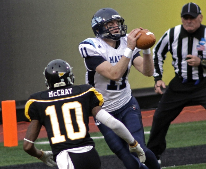 John Ebeling of the University of Maine breaks away from Demetrius McCray of Appalachian State to catch a third-quarter touchdown pass, giving the Black Bears a 27-6 lead on the way to a 34-12 victory and a quarterfinal berth against second-ranked Georgia Southern.