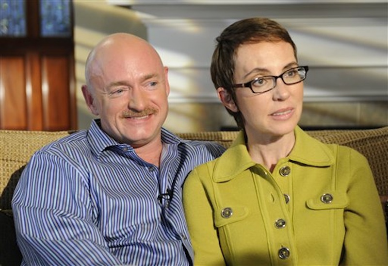 U.S. Rep. Gabrielle Giffords and husband Mark Kelly are interviewed by Diane Sawyer on ABC's 20/20. One year after being shot in the head, Rep. Gabrielle Giffords is on a mission to return to the job she so clearly loved. (AP Photo/ABC, Ida Mae Astute)