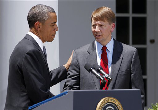 In this July 18, 2011, photo, President Barack Obama shakes hands with former Ohio Attorney General Richard Cordray after announcing his nomination to serve as the first director of the Consumer Financial Protection Bureau.