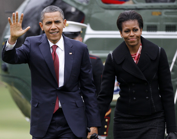 President Barack Obama and first lady Michelle Obama arrive on the South Lawn of the White House in this 2011 photo. 