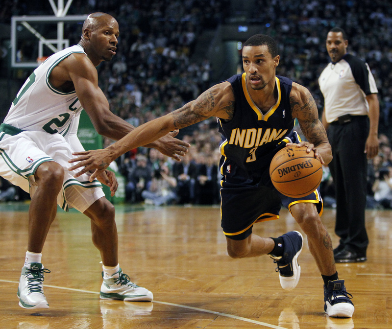George Hill of the Indiana Pacers drives past Boston's Ray Allen Friday night. The Pacers won, 87-74.