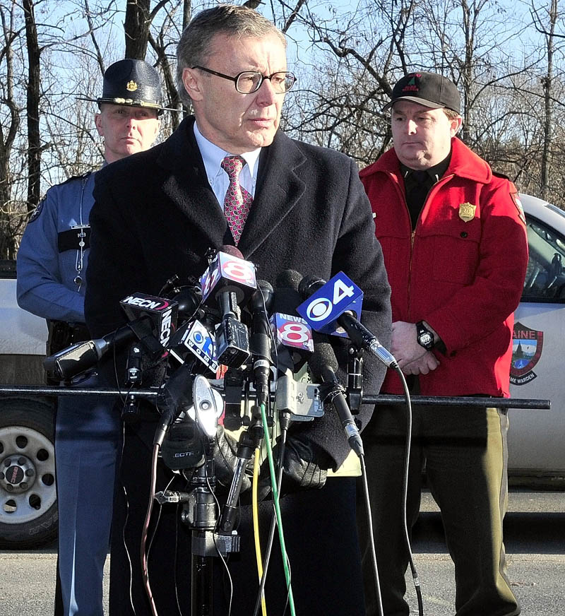 STATUS: Maine Department of Public Safety spokesman Steve McCausland addresses the media on the search for missing toddler Ayla Reytnolds in Waterville on Wednesday. Behind him is Lt. Don Pomelow, left, of the Maine State Police and Lt. Kevin Adams of the Maine Warden Service.