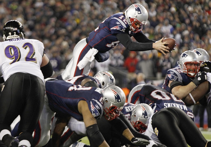 Tom Brady plunges into the end zone for the go-ahead touchdown early in the fourth quarter of the AFC championship game. Brady's touchdown gave the Patriots a 23-20 lead, and they held on to beat the Ravens for their seventh AFC title. playoff playoffs