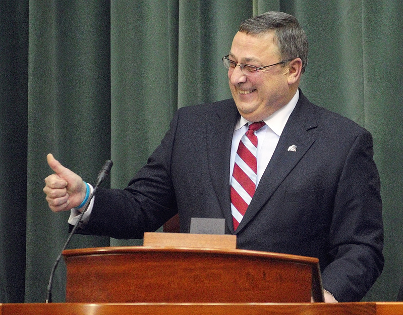 Gov. Paul LePage gestures near the end of his first State of the State address to a joint session of the Maine House and Senate tonight at the State House in Augusta.