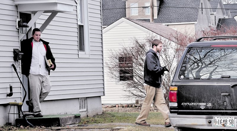 Justin DiPietro, right, leaves his mother’s home at 29 Violette Ave. in Waterville on Monday, followed by his brother Lance DiPietro. Justin DiPietro pleaded for the person who took his daughter, Ayla Reynolds, on Dec. 17 to return her to him.