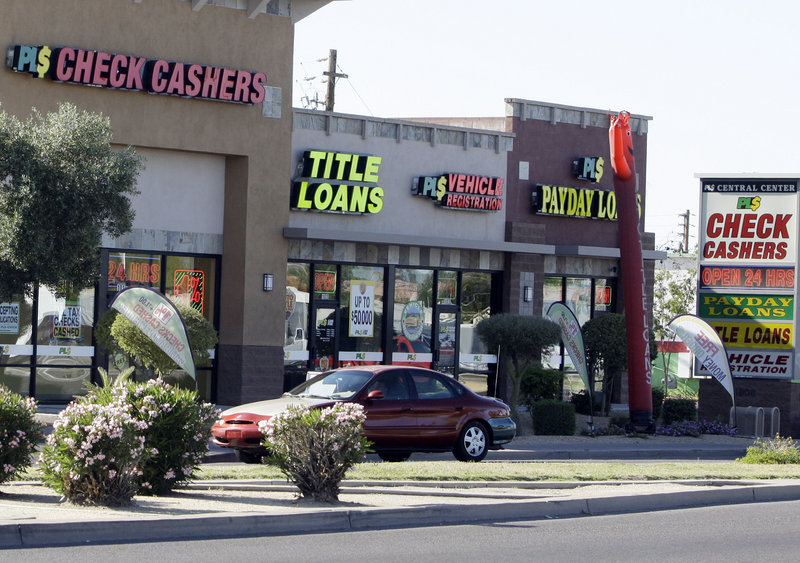 Payday loan businesses, like these in Phoenix, will now face oversight to ensure they disclose the full costs of their short-term loans, so consumers can make informed choices.