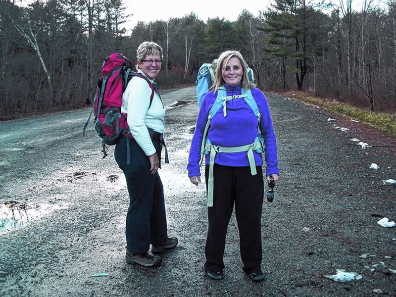 Sue Twombley, left, and Denise Scales take a 7-mile training hike in preparation for an Appalachian Trail thru-hike they’ll begin next month.
