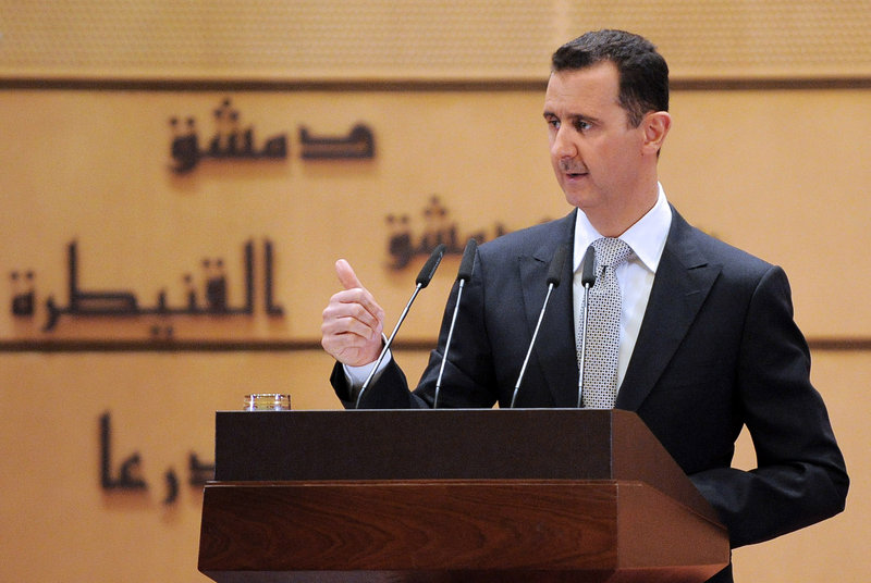 Syrian President Bashar Assad delivers a speech at Syria’s Damascus University on Tuesday.