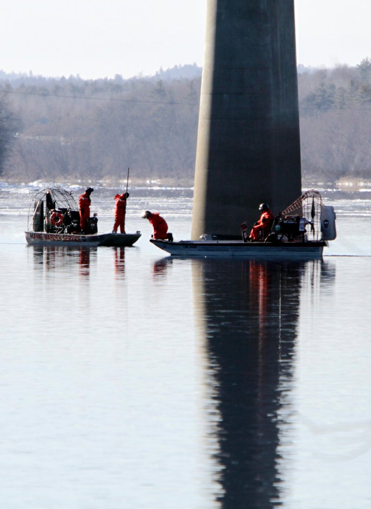 Members of the Maine Warden Service search the Kennebec River under the Carter Memorial Bridge in Waterville on Wednesday for any sign of 21-month-old Ayla Reynolds. The girl was reported missing from her grandmother’s home on Violette Avenue in Waterville on Dec. 17.