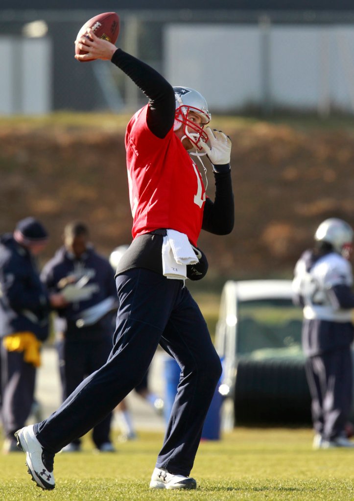Tom Brady throws a pass during practice for the Patriots on Wednesday. Brady rallied the Patriots to a win over the Broncos last month, and will try to win again Saturday night.
