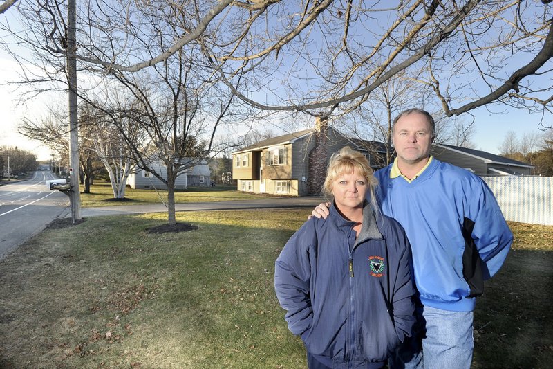 To refinance their Westbrook home, Nancy and Mike Heath had to hire a surveyor to prove that they do not live in a flood zone. If they hadn’t disputed the flood zone designation, they would have had to pay $1,700 a year for federal flood insurance.