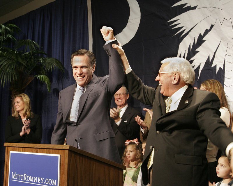 Former South Carolina Gov. Jim Edwards introduces former Massachusetts Gov. Mitt Romney in Columbia, S.C., in February 2007. Later that year, Romney was targeted by a bogus, inflammatory Christmas card signed by "The Romney Family’" that was sent to GOP voters.