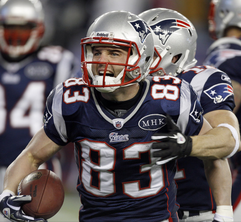 Wes Welker celebrates after catching a 7-yard touchdown pass to cap a lightning-quick drive on the first possession of the game. The Patriots went 80 yards in four plays.