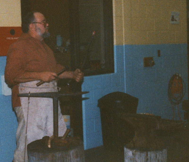 Peter Cain teaches a blacksmithing class at Gardiner High School in the late 1980s. Mr. Cain died Friday at a Portland nursing home at age 74.