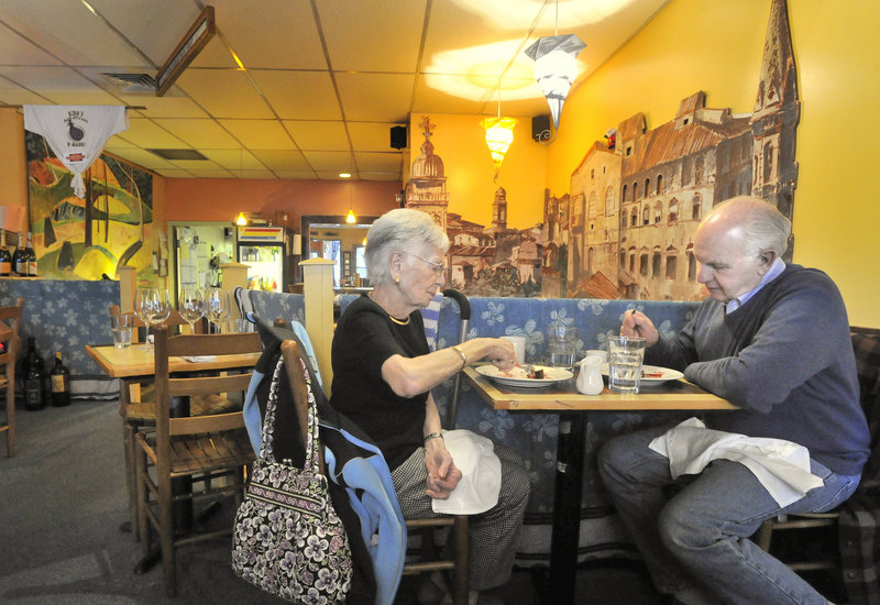 Eleanor Panzuto of Portland enjoys lunch at Bibo's Madd Apple Cafe in Portland with her nephew, Frank Pandolfo, also of Portland. The restaurant has long been a popular stop with theater goers heading for the nearby Portland Stage Company.