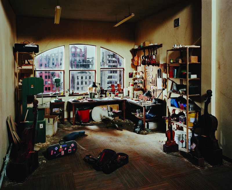 “Violin Repair Shop,” a photograph by Lori Nix from her exhibition “The City,” on view through March 24 at the UMaine Museum of Art in Bangor.