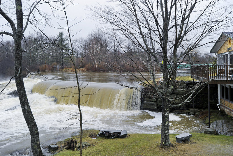 The town of Yarmouth has begun considering the pros and cons of removing two dams on the Royal River. The dam off East Elm Street, which borders a home on Melissa Drive, serves mainly as an impoundment, keeping river levels high in the summer.