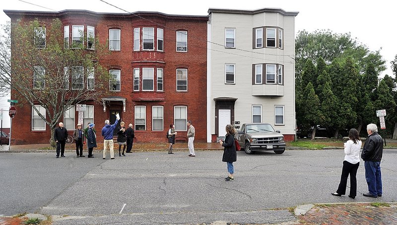 A group from Artspace, based in Minneapolis, and members of the Portland arts community check out a potential live/work space for artists last September on Federal Street in the India Street neighborhood.