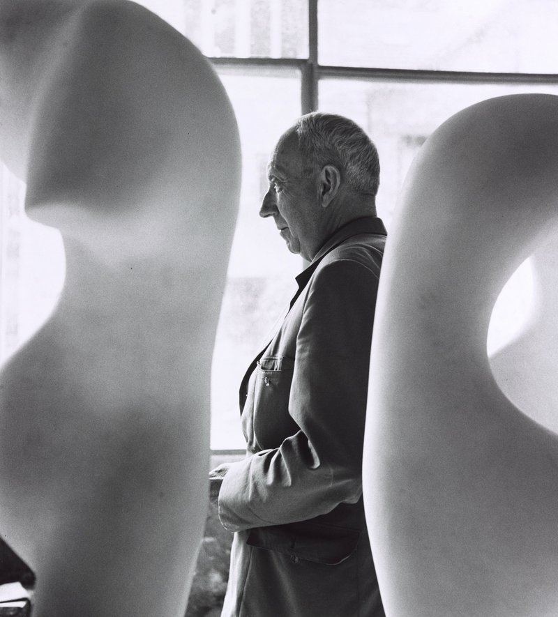 Jean Arp, middle, as photographed by Robert Doisneau, 1958, printed 1984, gelatin silver print.