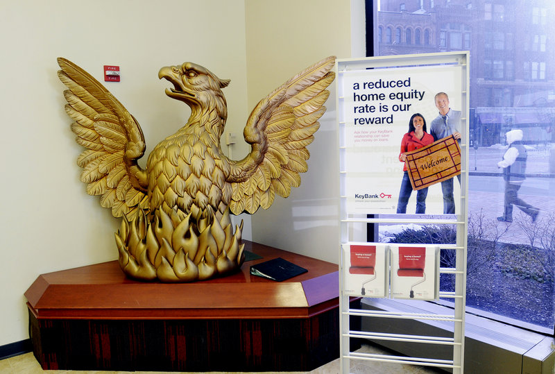 A fiberglass replica of the lost wooden phoenix is seen at Key Bank at Monument Square in Portland Thursday. Historians and others want to know what happened to the original, carved for a bank rebuilt after the city’s Great Fire on July 4, 1866.
