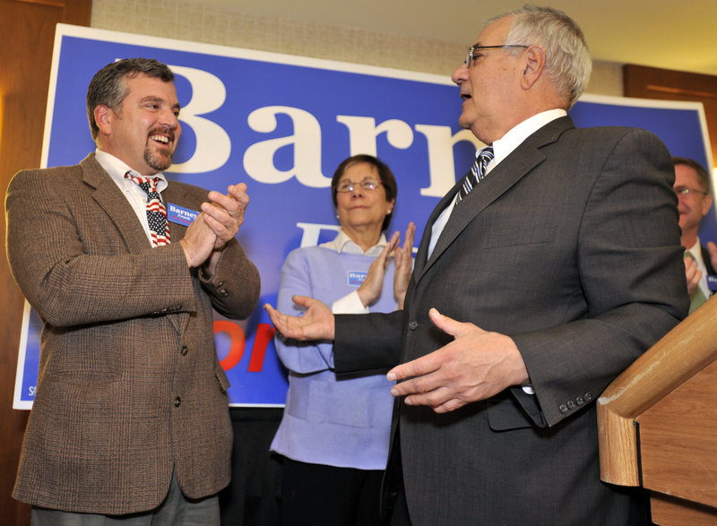 Rep. Barney Frank, D-Mass, right, recognizes his partner, Jim Ready, at a re-election party in Newton. Mass., in November of 2010. A spokesman for Frank confirmed Thursday that Frank plans to marry Ready.