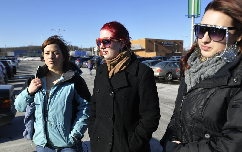 From left, Simi Russell, 18, Dessirrea Meyer, 16, and Amanda VanBrocklin, 17, all of Portland, talk about the proposed new requirements for young drivers to get their licenses while at the Maine Mall on Sunday.