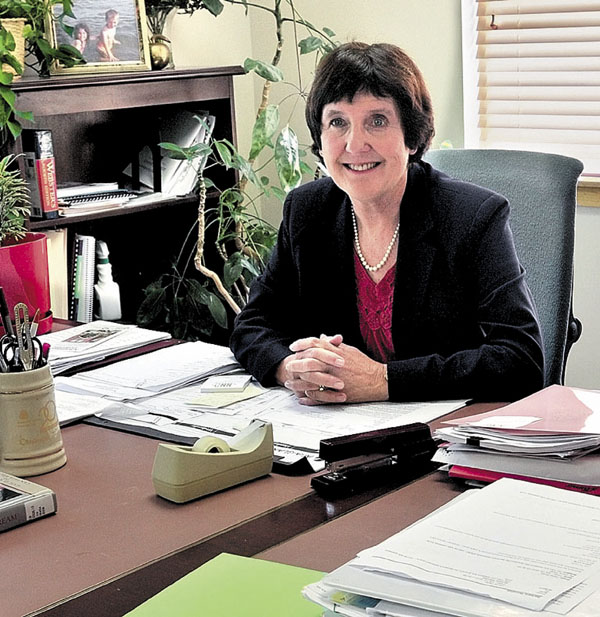 In this 2012 photo, Kennebec Valley Community College President Barbara Woodlee sits in her office at the former Teague Center in Fairfield.