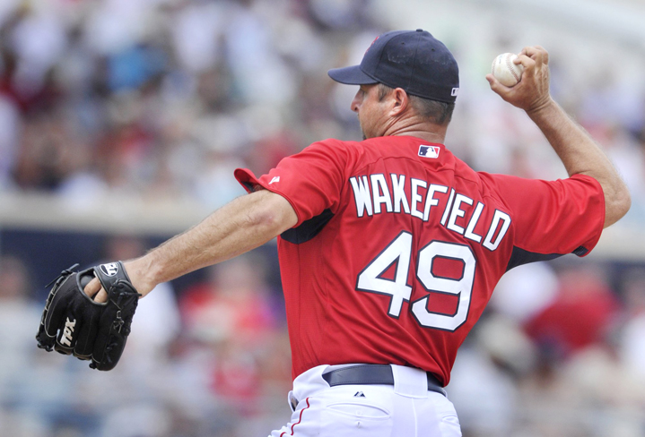 In this March 29, 2011, photo, Red Sox pitcher Tim Wakefield delivers a knuckle ball during an outing against the Tampa Bay Rays in the final home exhibition game of spring training.