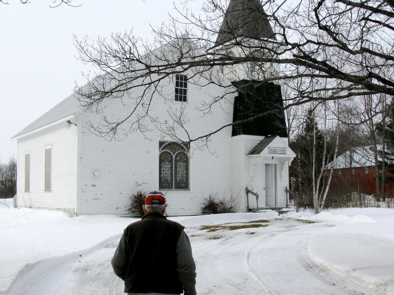 Bill Findlen walks toward the Friends Church in Maple Grove earlier this month.