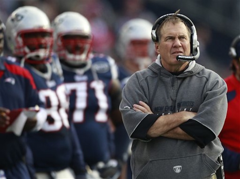 In this Dec. 4 photo, New England Patriots head coach Bill Belichick watches the action during an NFL football game against the Indianapolis Colts. The AP predicts the New York Giants will beat the Patriots in the Super Bowl on Sunday. (AP Photo/Elise Amendola)