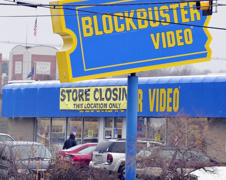 A customer heads into a Blockbuster location at 219 Waterman Drive in South Portland on Wednesday. This store and two others in Maine – one in Westbrook and another in Lewiston – are either closed or in the process of closing as part of a business decision by Blockbuster’s parent company, Dish Network.