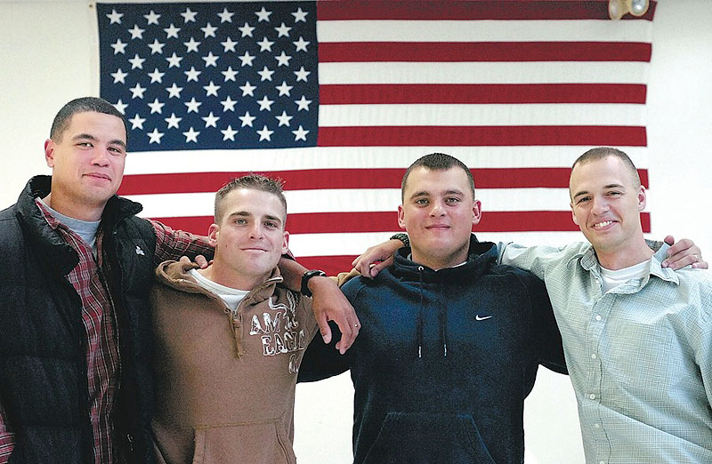 This photo from 2006 shows U.S. Marines and Madison High School alumni Isaah Finney, Kurt Fegan, Jeff Hayden and Adam Rich, left to right, who served together in Iraq and Afghanistan.