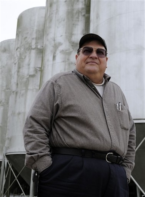 Rice farmer Ray Stoesser stands outside his rice elevator on Tuesday in Dayton, Texas.