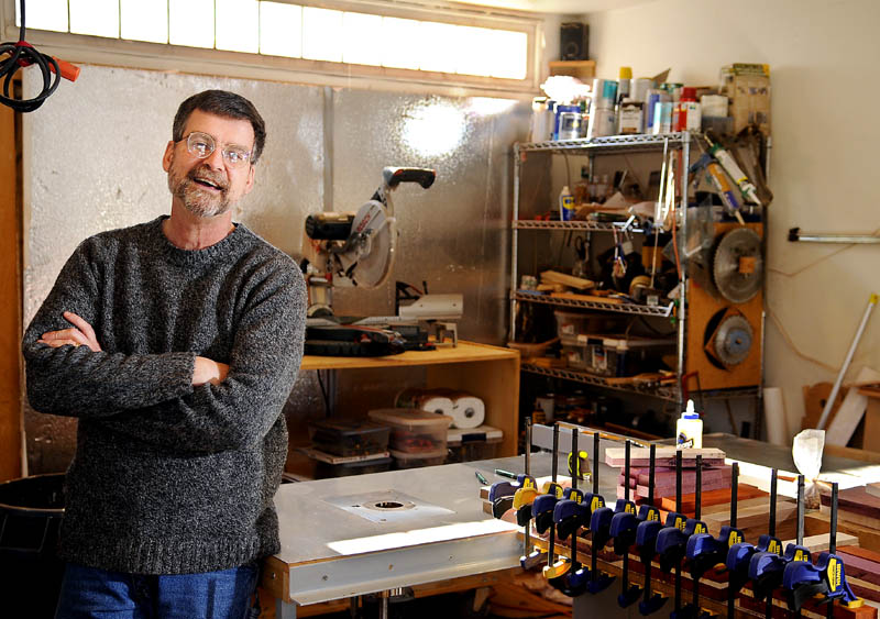 Dr. Kieran Kammerer builds wooden heirlooms, including bowls and baby rattles, at his Hallowell shop. The pediatrician's hand crafted collectibles are sought across the world.