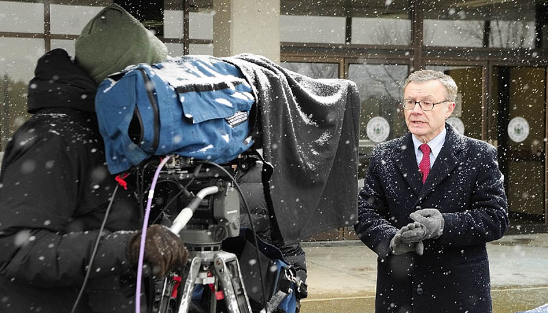 Maine State Police spokesman Steve McCausland stands in the snow outside the Department of Public Safety in Augusta as he is interviewed via satellite about the Ayla Reynolds case on a national news show on Tuesday afternoon.