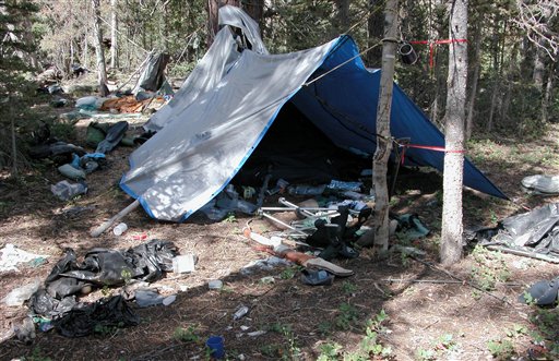 A remote camp littered with supplies and trash authorities believe was left behind by an elusive mountain man.