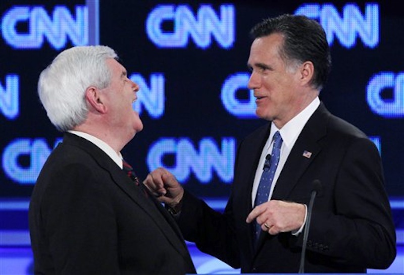 In this Jan. 26, 2012 photo, Republican presidential candidates Newt Gingrich and Mitt Romney talk during a commercial break at a debate in Jacksonville, Fla. (AP Photo/Matt Rourke, File) Mitt Romney,Newt Gingrich