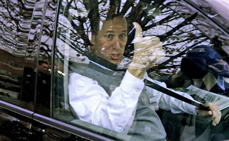 Republican presidential candidate and former Pennsylvania Sen. Rick Santorum gives a thumbs up to supporters. (AP Photo/Charles Dharapak)